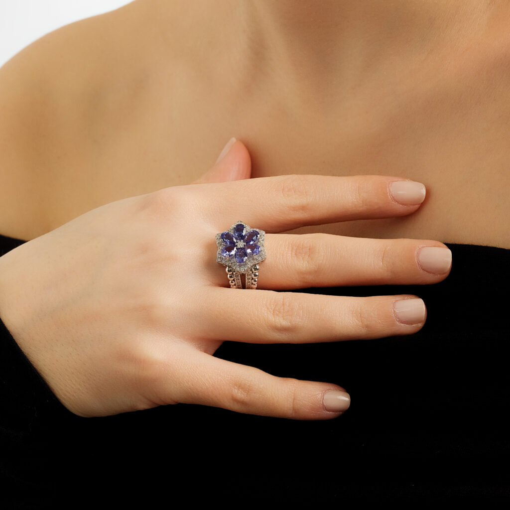 Bloom Bosphorus Statement Ring — tanzanite flower with diamonds in white gold, worn on hand