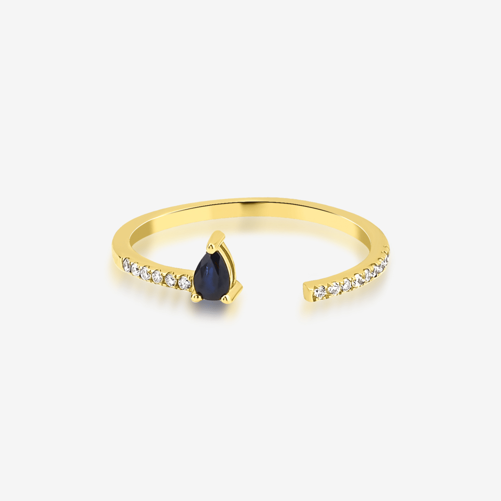 Larcivet Night Ring — pear-cut sapphire and diamonds on an open yellow gold band, top view
