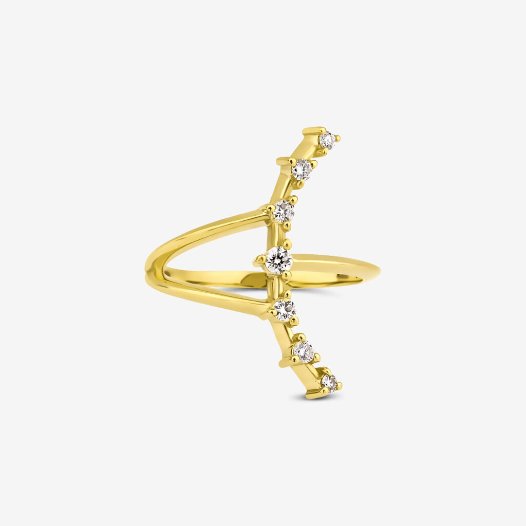 Kuyruklu Star Ring — brilliant diamonds tracing a shooting star silhouette, yellow gold, top view