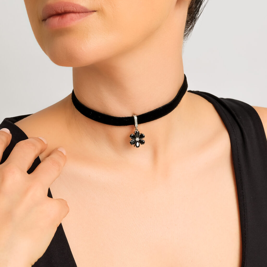 Dark Mystery Pendant — lab-created black spinel petals with a center diamond, white gold, worn on neck