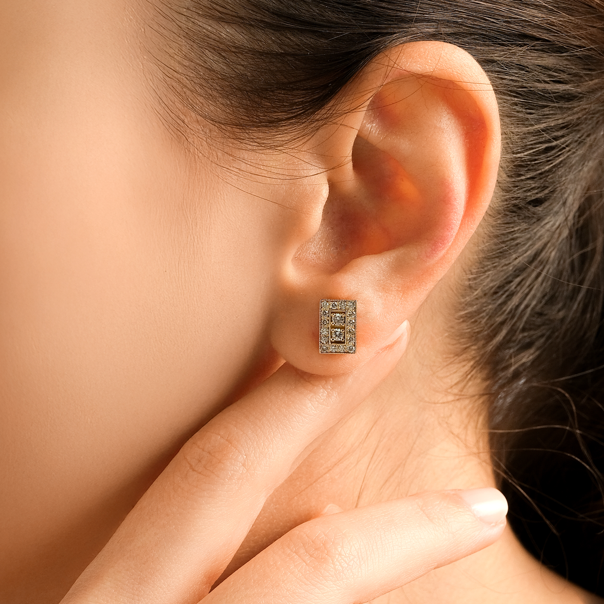 Geometric Diamond Earrings — architectural studs paved with diamonds, yellow gold, worn on ear