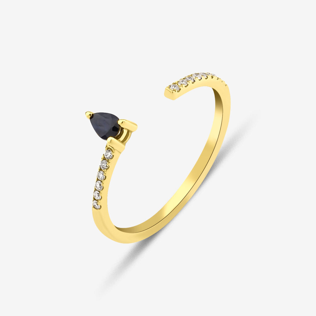 Larcivet Night Ring — pear-cut sapphire and diamonds on an open yellow gold band, side view