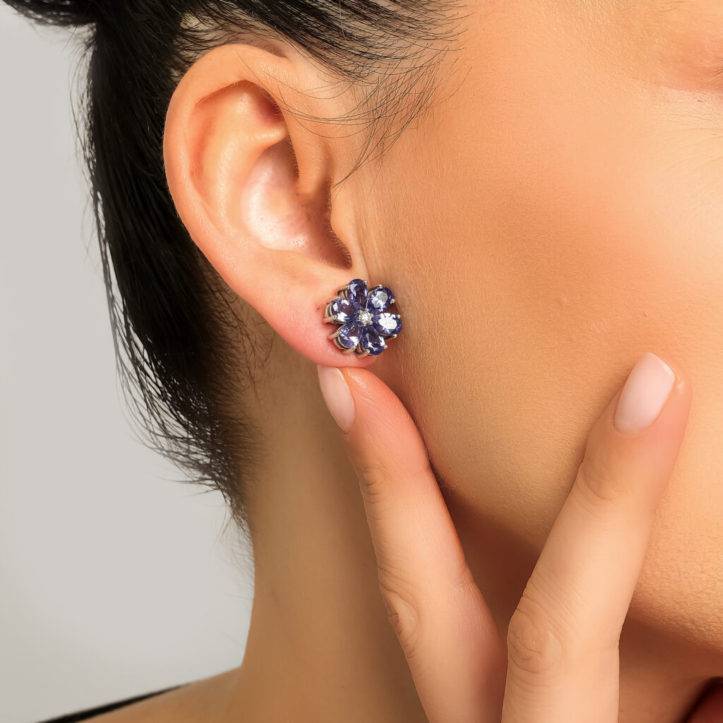 Midnight Bosphorus Earrings — lab-created tanzanite with a center diamond, white gold, worn on ear