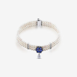 Pearl Bosphorus Choker — natural pearls with a lab-created tanzanite flower, white gold, side view
