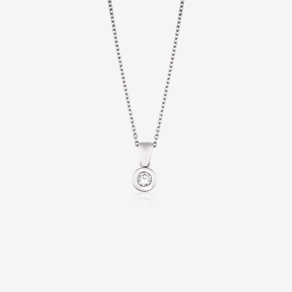 Sade Solitaire Necklace — single brilliant diamond on a white gold chain, top view